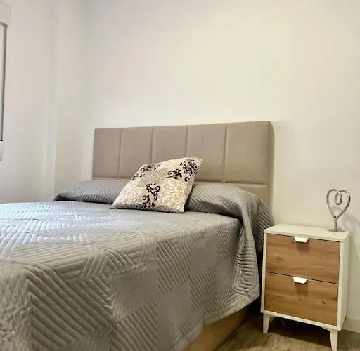 Detail Palmeras Адехе