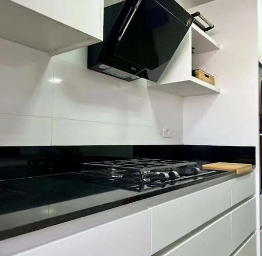 Detail Palmeras Адехе